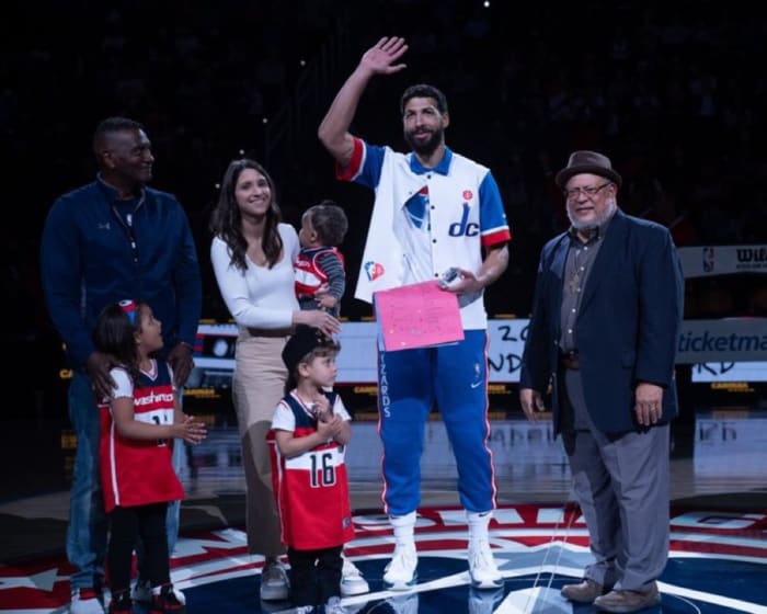 Anthony Gill with his family after receiving the E.B. Henderson Team Award for his community work earlier this year